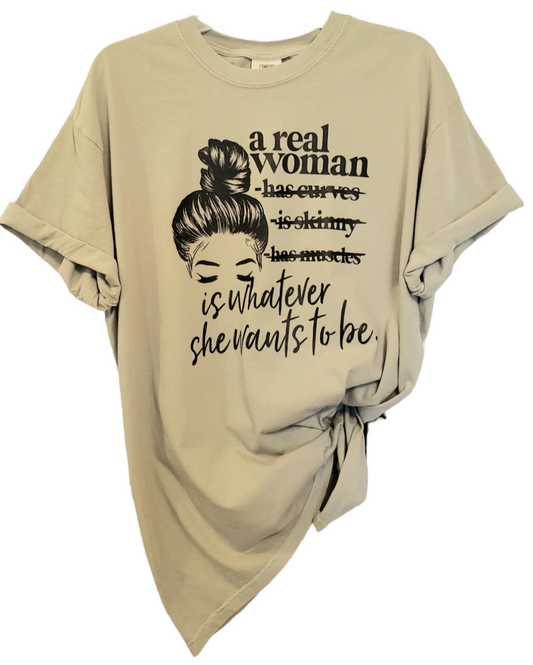 A Real Woman Comfort Colors Sandstone Unisex Tshirt